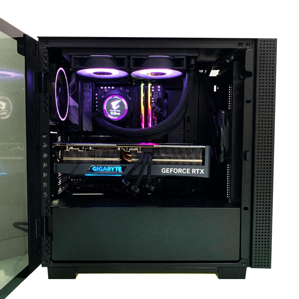 Ultra Razer Tomahawk gaming desktop in a black mid-tower case with green Razer logo, visible RGB fans, GeForce RTX 4080, 32GB RAM, 1TB SSD, 1TB HDD, and Windows 11 Home callouts